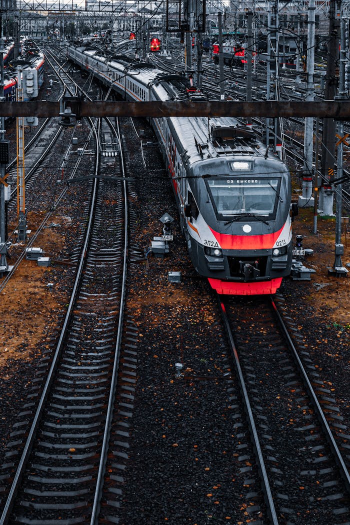 services-01 Dynamic shot of a modern passenger train navigating tracks in Moscow.